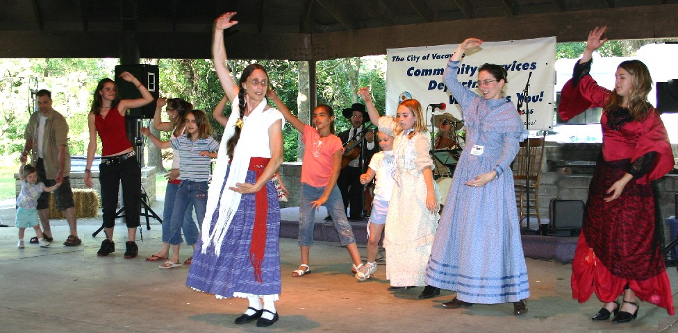 Vykki teaching dances at Peña Adobe Fandango